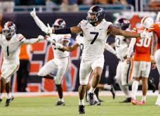 UVA Football Narrowly Escapes Miami to win 1st Conference Game